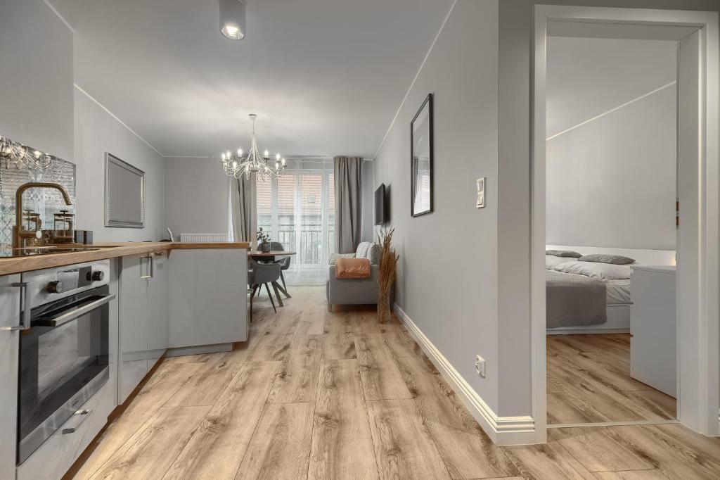 Kuchyňa alebo kuchynka v ubytovaní Apartamenty MUNN 3 Szczecin