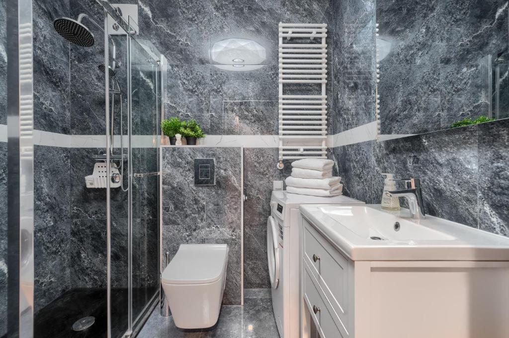 Kúpeľňa v ubytovaní Apartamenty MUNN 3 Szczecin