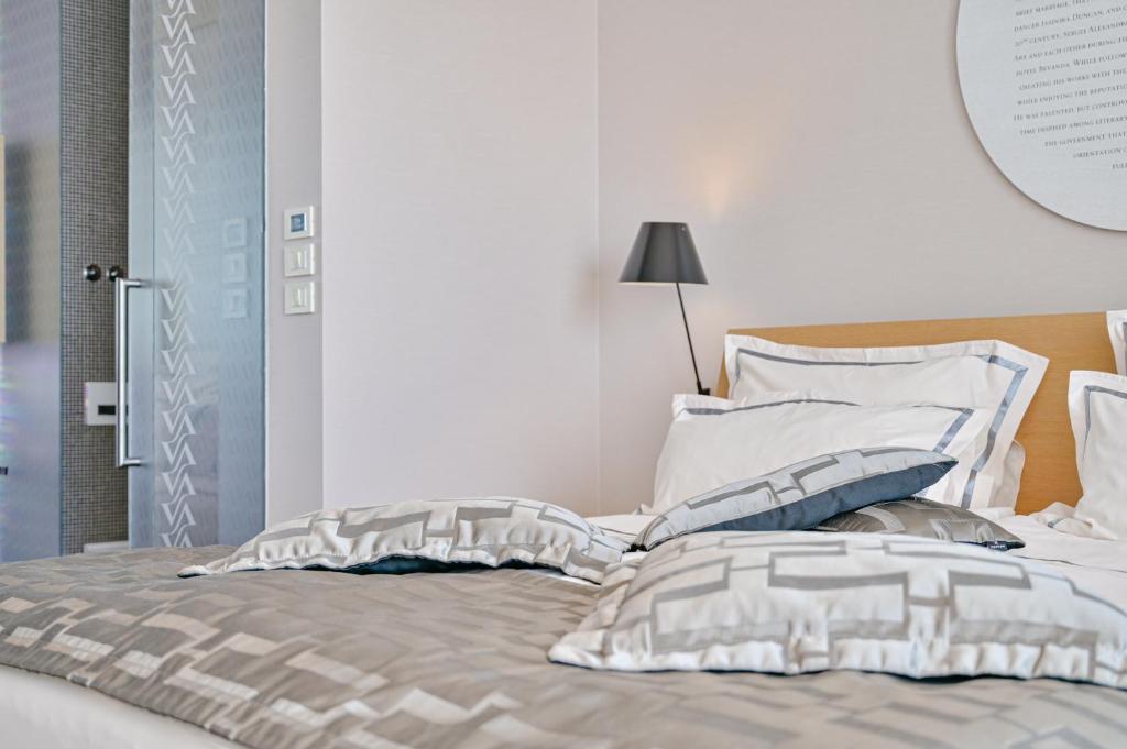 Postel nebo postele na pokoji v ubytování Bevanda Hotel & Restaurant - Unique Adriatic