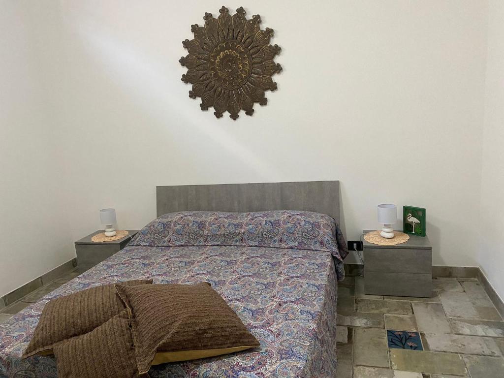 Posteľ alebo postele v izbe v ubytovaní CasaCate