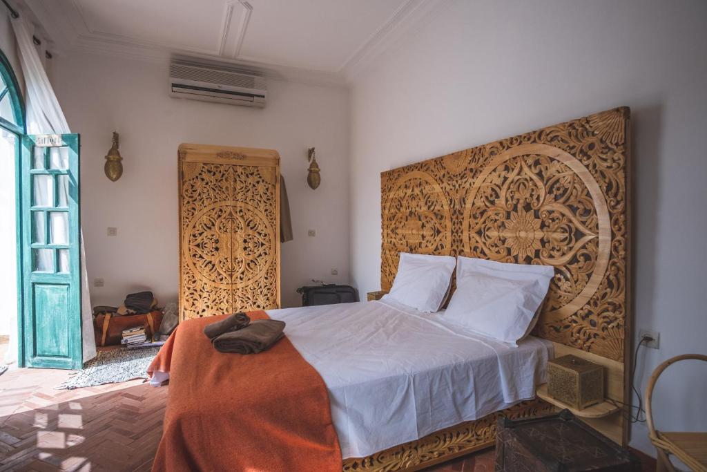 Postel nebo postele na pokoji v ubytování Riad Villa Berna under Swiss Management