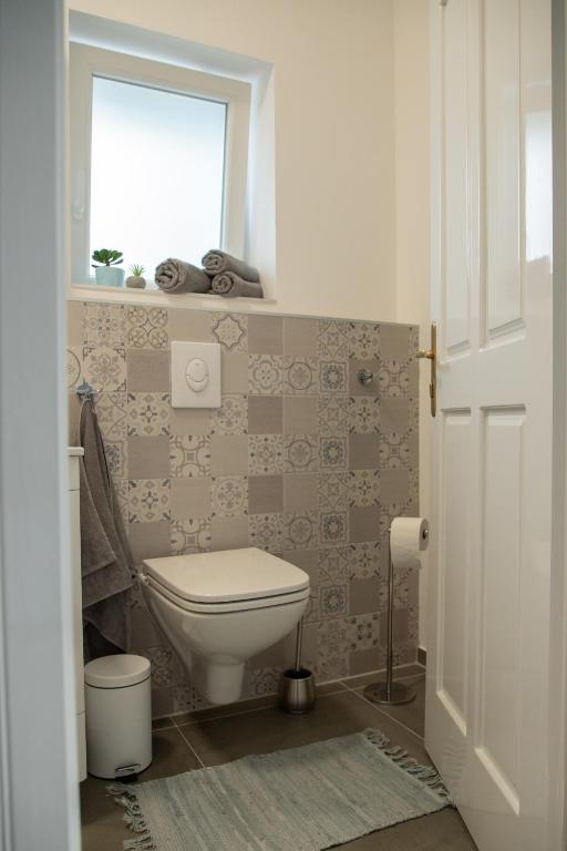 Kupatilo u objektu Apartmani 64