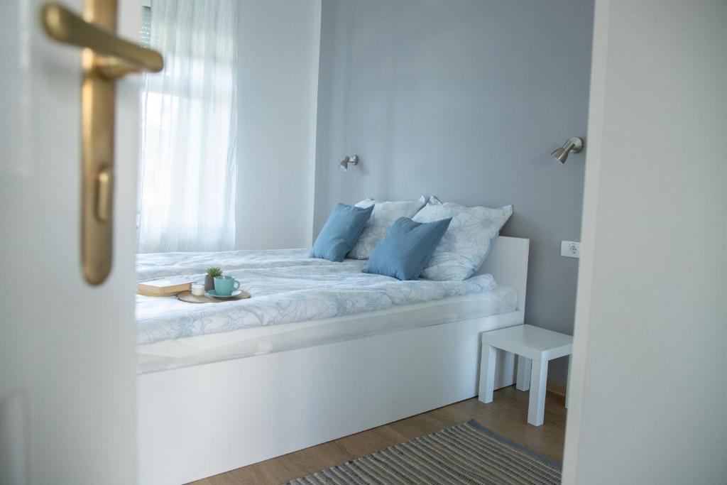 Krevet ili kreveti u jedinici u okviru objekta Apartmani 64