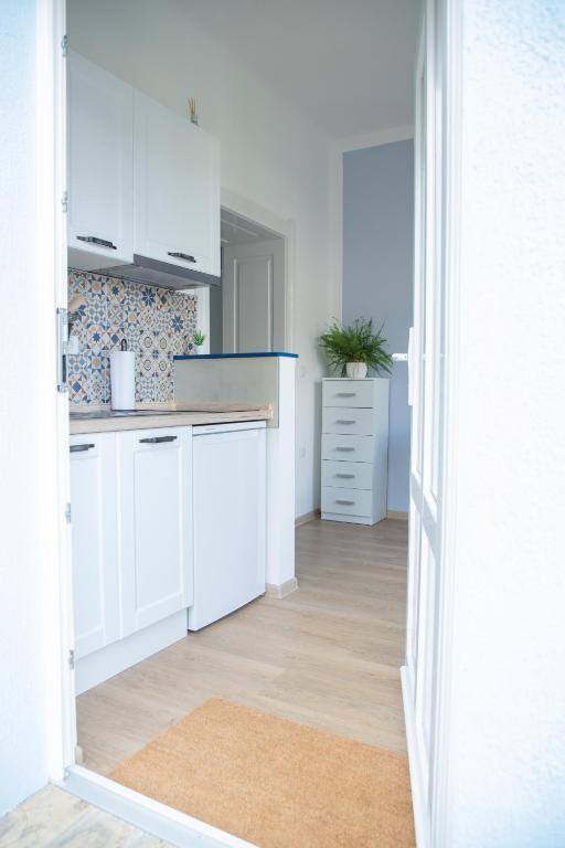 Kuhinja ili čajna kuhinja u objektu Apartmani 64