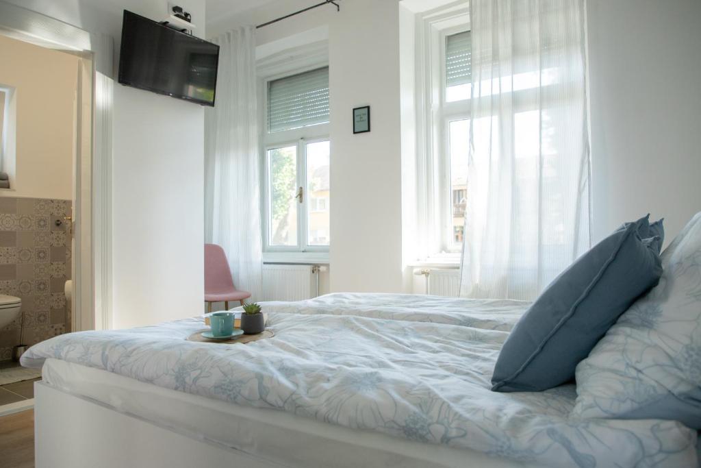 Krevet ili kreveti u jedinici u okviru objekta Apartmani 64