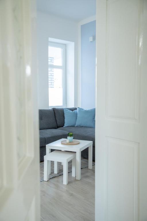 Prostor za sedenje u objektu Apartmani 64
