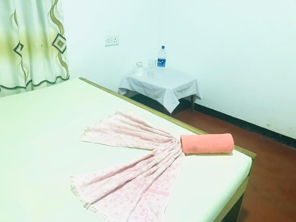 Postel nebo postele na pokoji v ubytování Akila's Hideaway