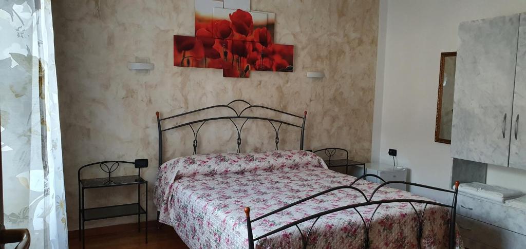 Una cama o camas en una habitación de Le Rustiche Foresteria