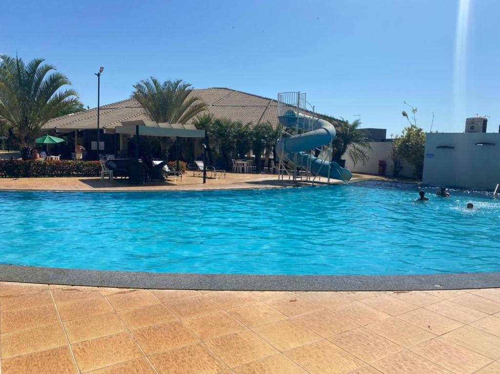 Πισίνα στο ή κοντά στο Enseada Nautico Residence DE PAULA