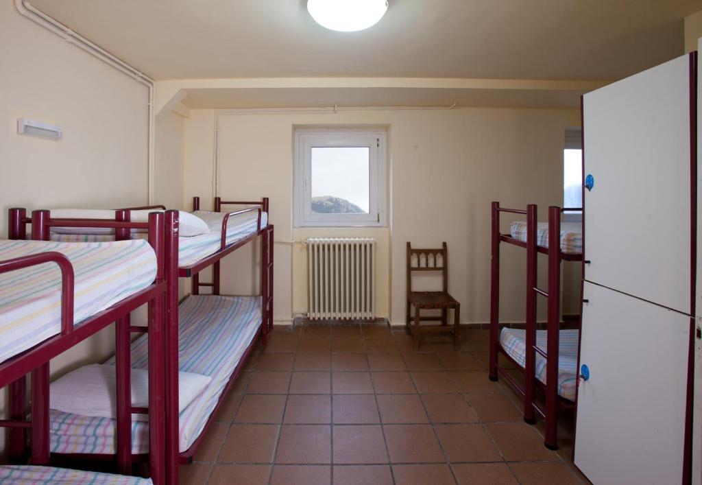 Postel nebo postele na pokoji v ubytování Alberg Núria Xanascat