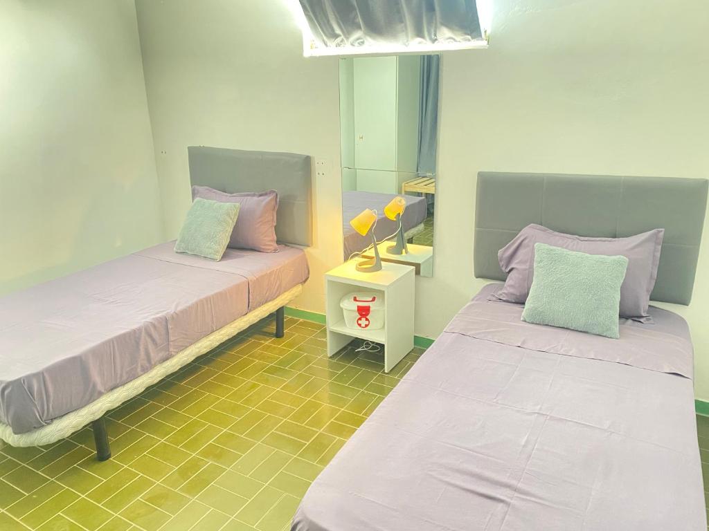 Postel nebo postele na pokoji v ubytování Best Rooms- Quarto 2 Plateau