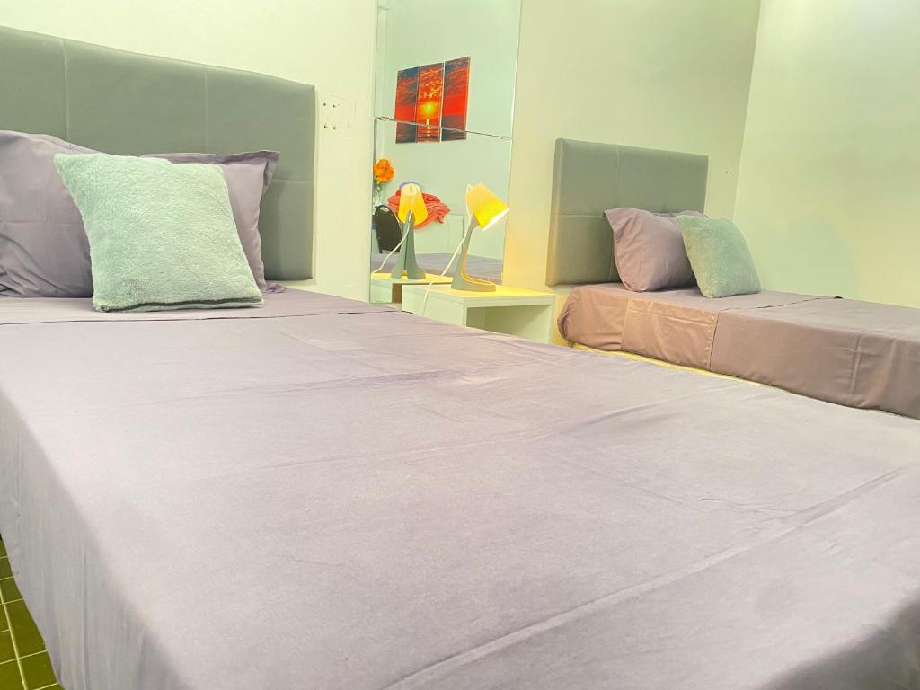 Postel nebo postele na pokoji v ubytování Best Rooms- Quarto 2 Plateau
