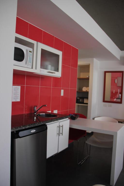 Kuchyň nebo kuchyňský kout v ubytování Roberta Rosa De Fontana Suites