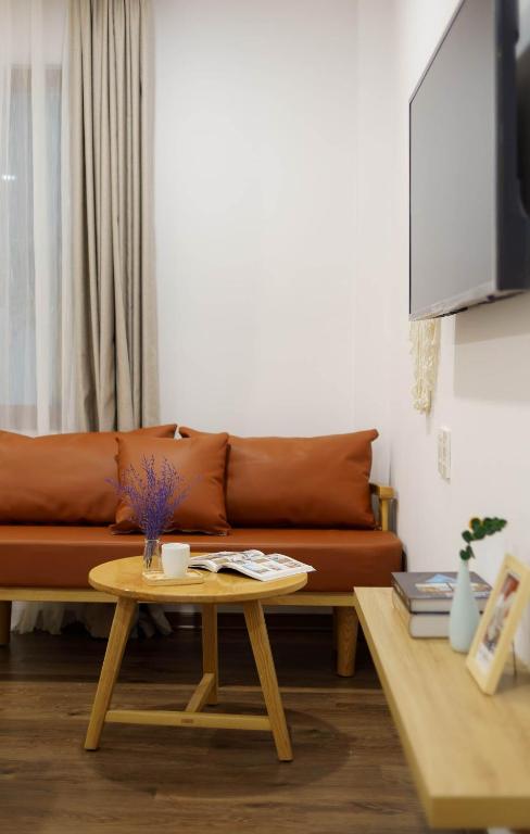 TV a/nebo společenská místnost v ubytování LATA Hotel & Apartments