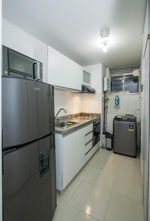 Kuchyň nebo kuchyňský kout v ubytování Apartaestudio atractivo, confortable, muy completo, familiar