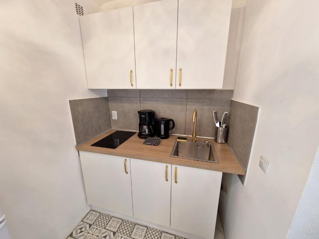 Kuchyňa alebo kuchynka v ubytovaní GregBnb - T2 Design 30m2 - Ouest