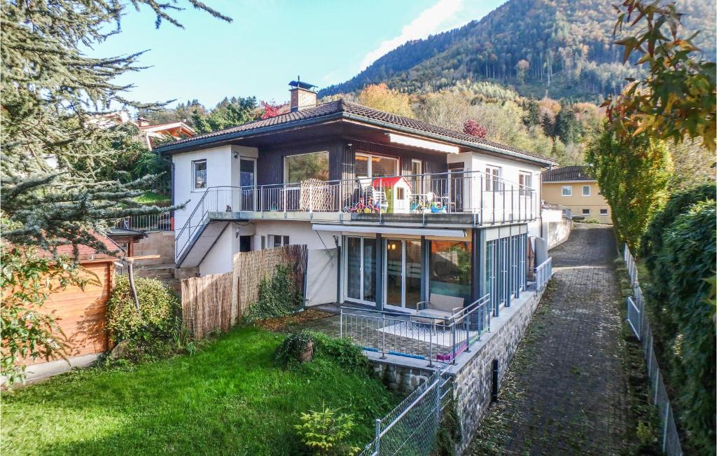 a house on a hill with a balcony at Beautiful Apartment In Feldkirch With Wifi And 2 Bedrooms in Feldkirch