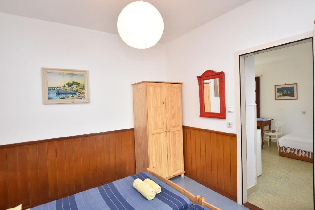 Katil atau katil-katil dalam bilik di Apartments Ziva