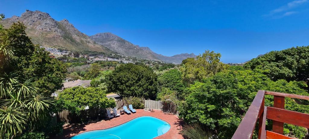 an overhead view of a swimming pool with mountains in the background at The Salt House in Hout Bay