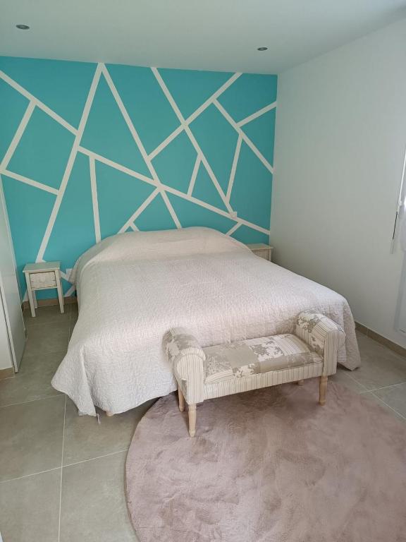 Posteľ alebo postele v izbe v ubytovaní Le Petit Gîte du Mont