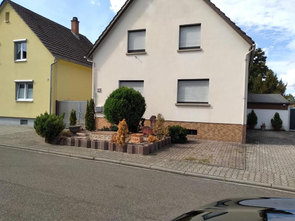 a house on the side of a street at Monteursunterkunft Wiesental in Waghäusel