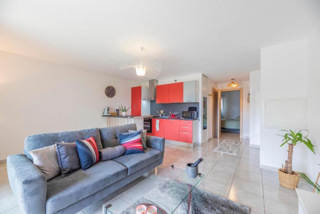 Posedenie v ubytovaní Appartement cosy et spacieux avec jardin et parking