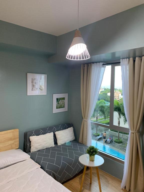 Homey Studio in Alabang near Molito with Wifi and Netflix