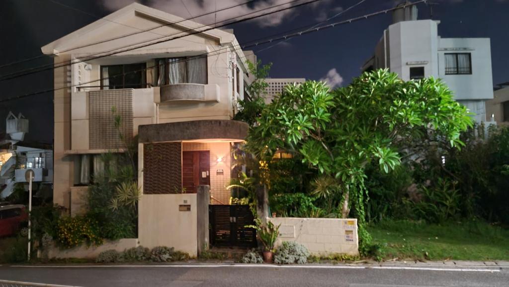 a house on the side of a street at Haruka 和室 in Naha