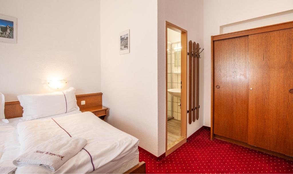 Postel nebo postele na pokoji v ubytování Hotel Köppeleck