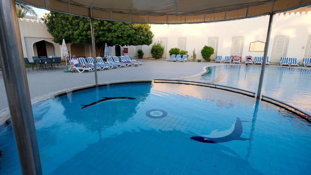 Bazén v ubytování Falaj Daris Hotel nebo v jeho okolí