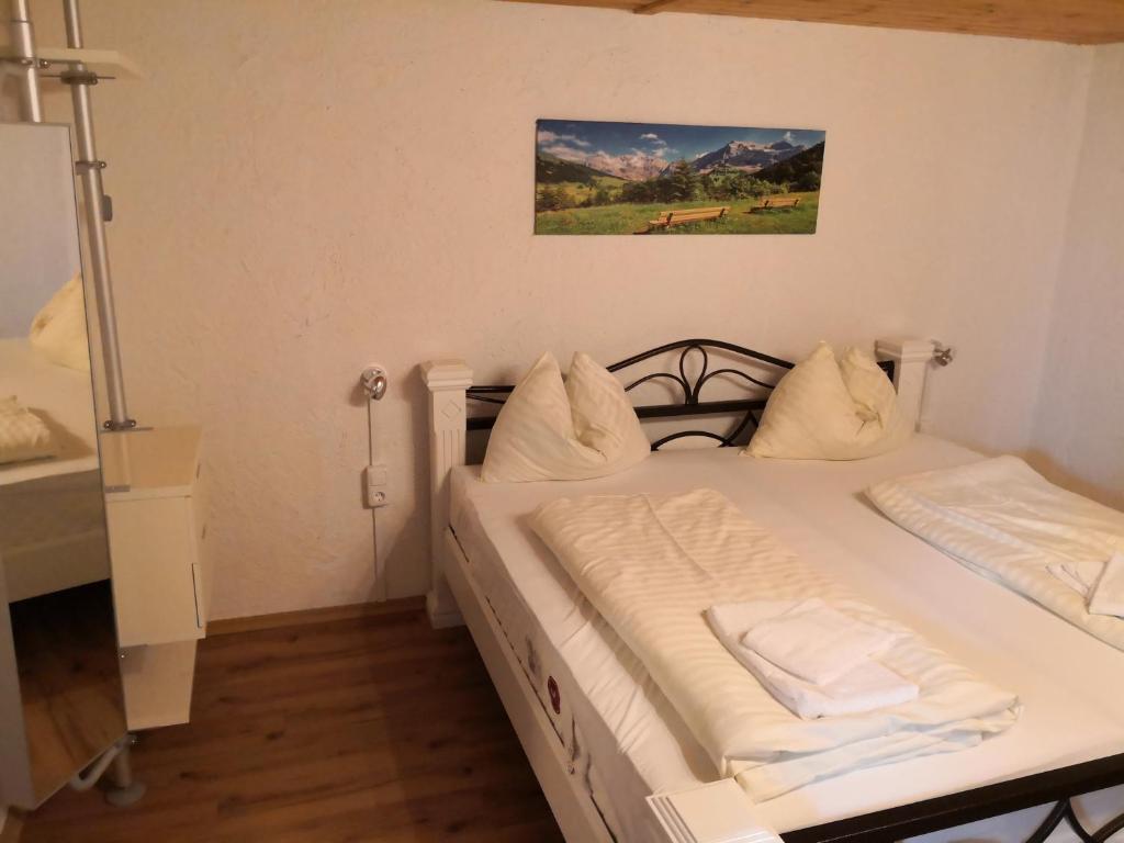 Postel nebo postele na pokoji v ubytování Alpen Chalet Bramberg