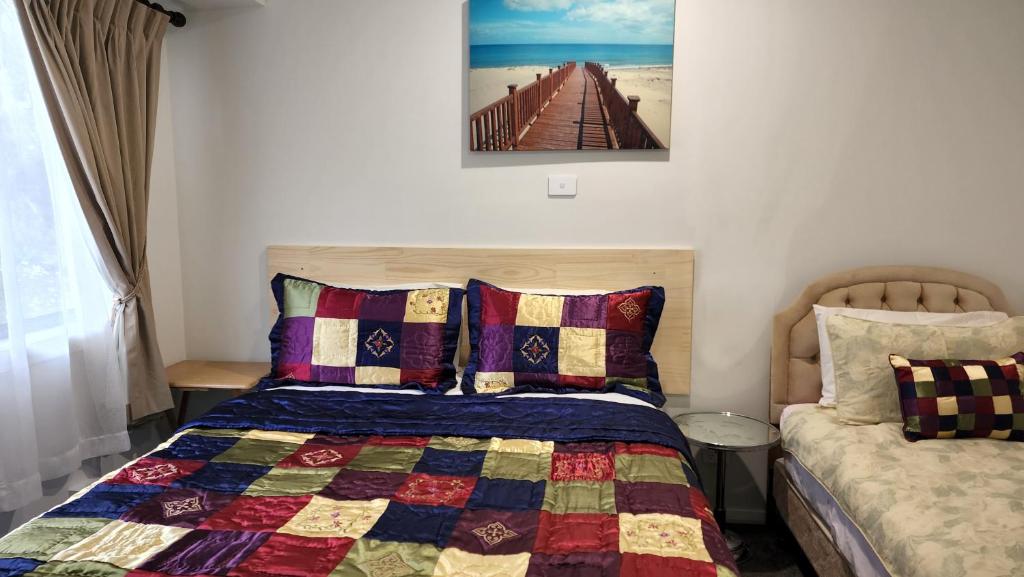 Letto o letti in una camera di Gowrie Agapanthus