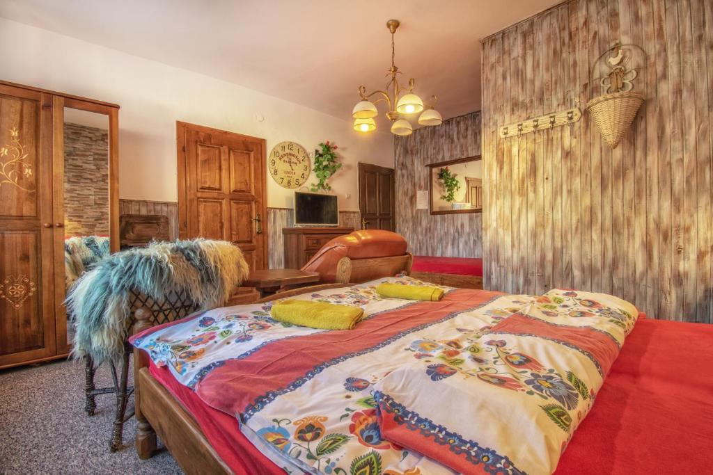 Postel nebo postele na pokoji v ubytování Penzion Šilon