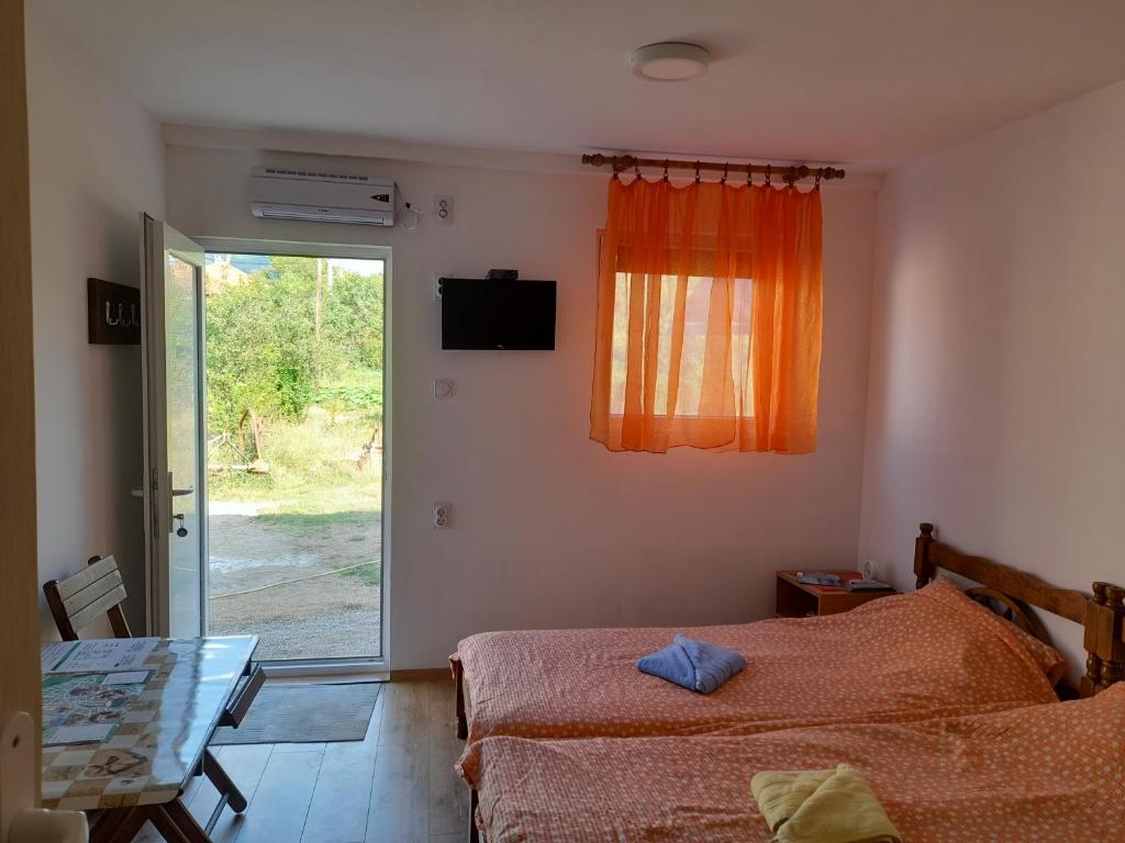 Postel nebo postele na pokoji v ubytování Stefanović - Studio 1