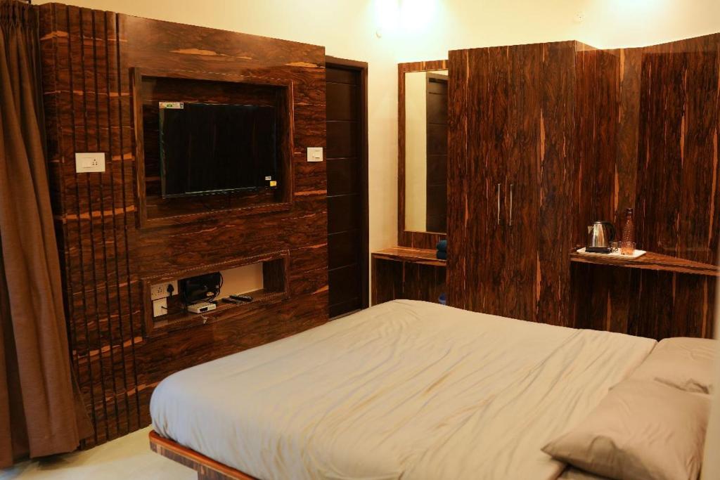 Postel nebo postele na pokoji v ubytování Melody Inn Luxury Home Stay