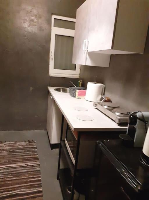 Kuchyňa alebo kuchynka v ubytovaní Athens Mets-Central apt