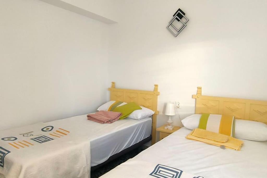 A bed or beds in a room at RELAX