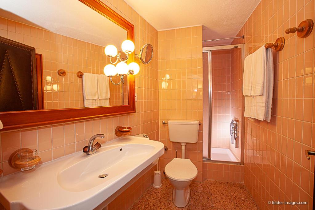 Koupelna v ubytování Hotel Astoria