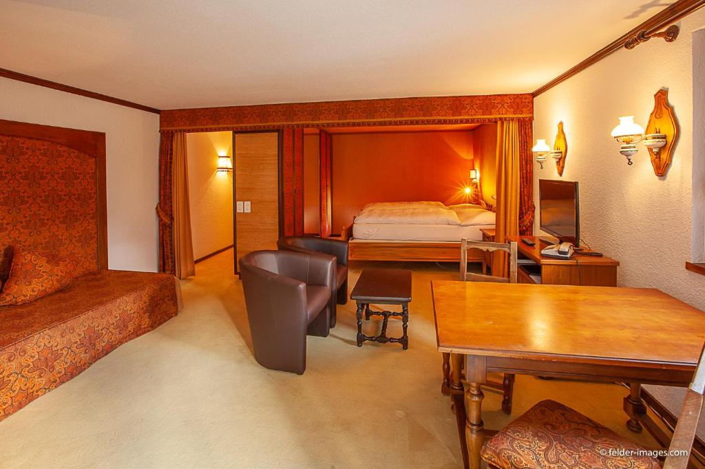 Postel nebo postele na pokoji v ubytování Hotel Astoria