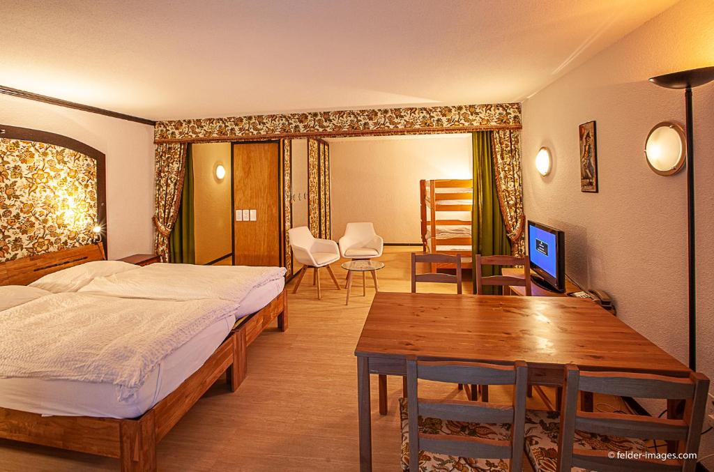 Postel nebo postele na pokoji v ubytování Hotel Astoria