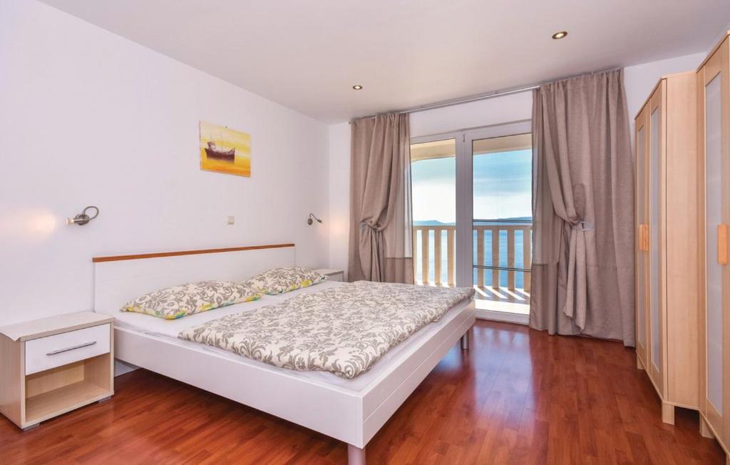Postel nebo postele na pokoji v ubytování Villa Anči