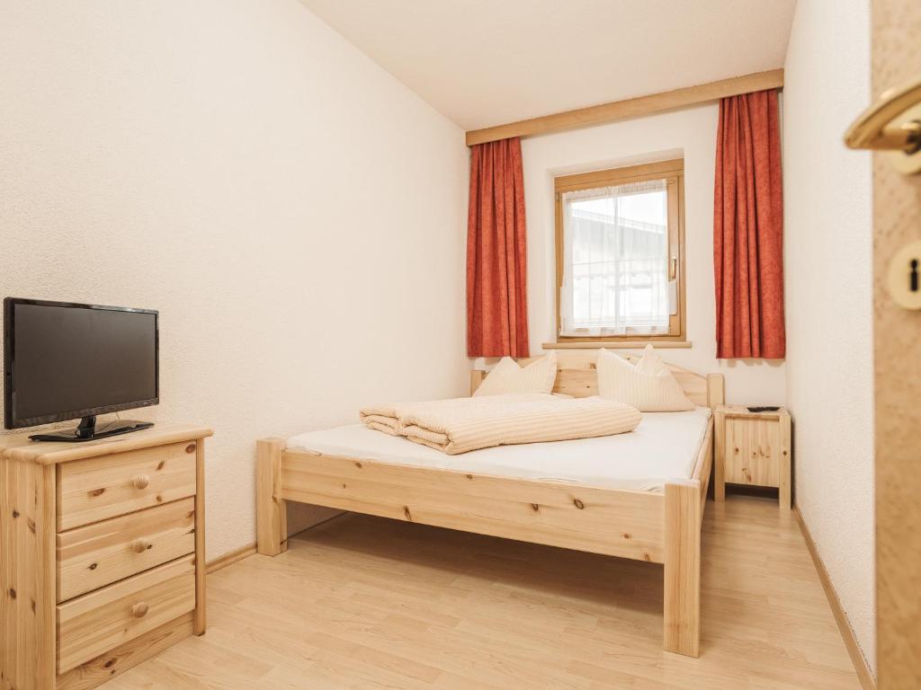 TV a/nebo společenská místnost v ubytování Deluxe Apartment Sonnseite