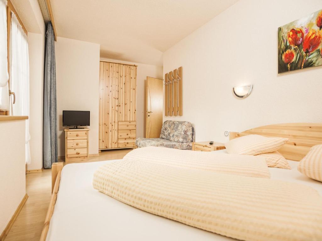 Postel nebo postele na pokoji v ubytování Deluxe Apartment Sonnseite