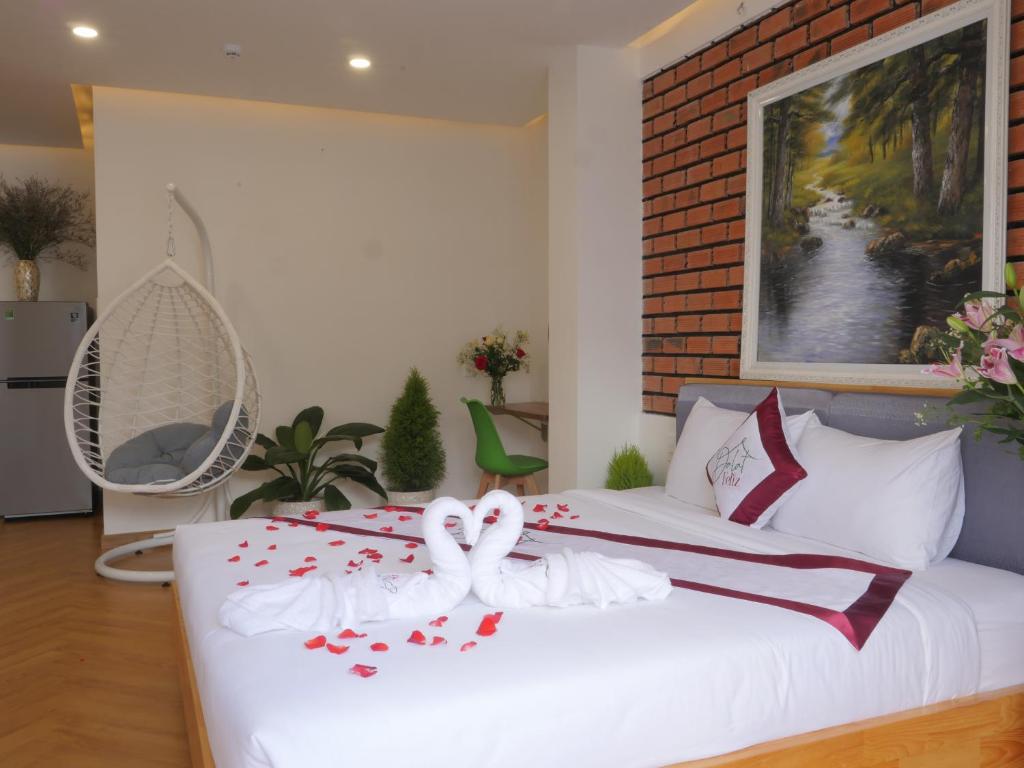 Giường trong phòng chung tại Feliz Dalat Homestay