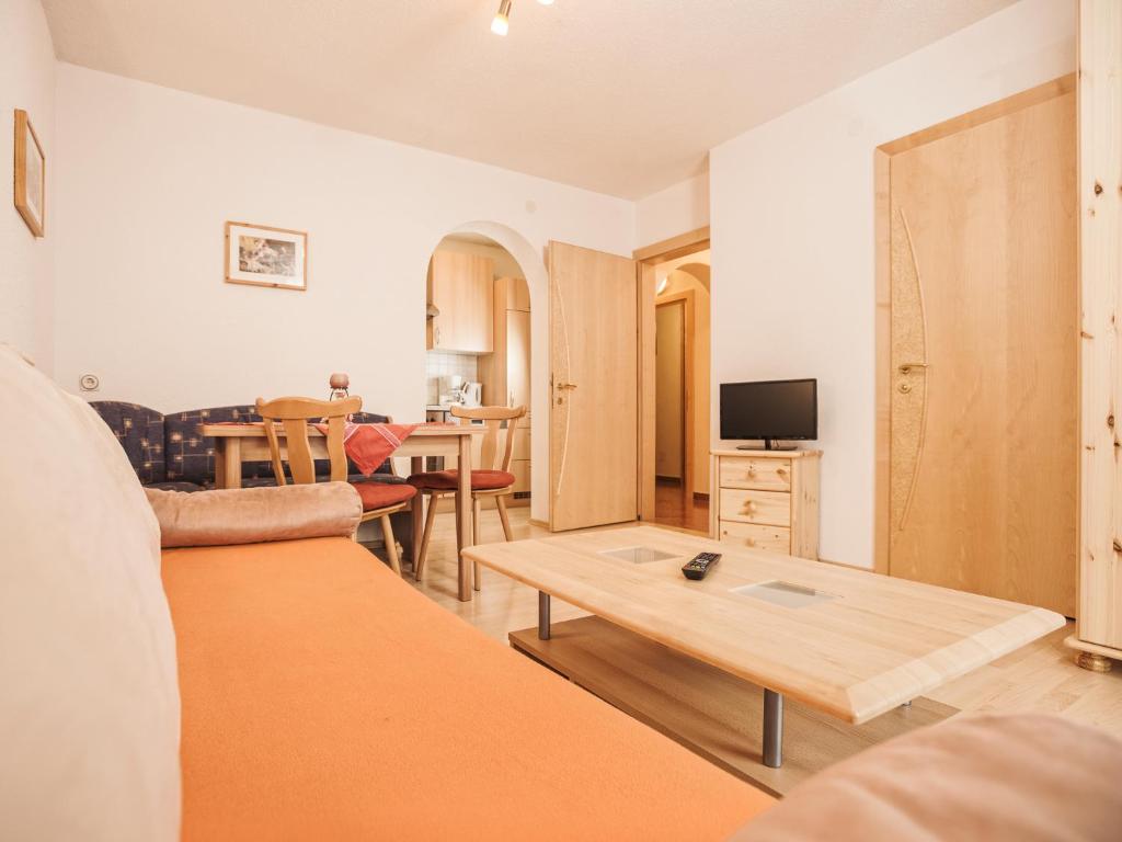 TV a/nebo společenská místnost v ubytování Deluxe Apartment Sonnseite
