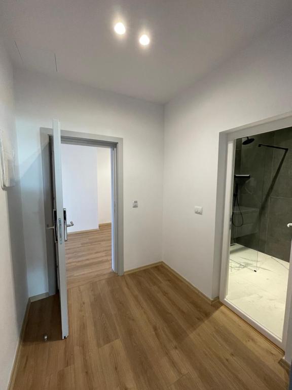 Postel nebo postele na pokoji v ubytování Ladi Rooms