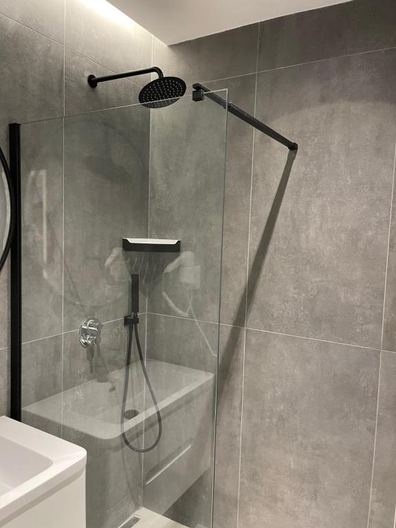 Koupelna v ubytování Ladi Rooms