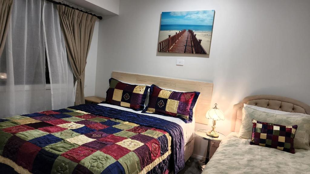 Letto o letti in una camera di Gowrie Agapanthus