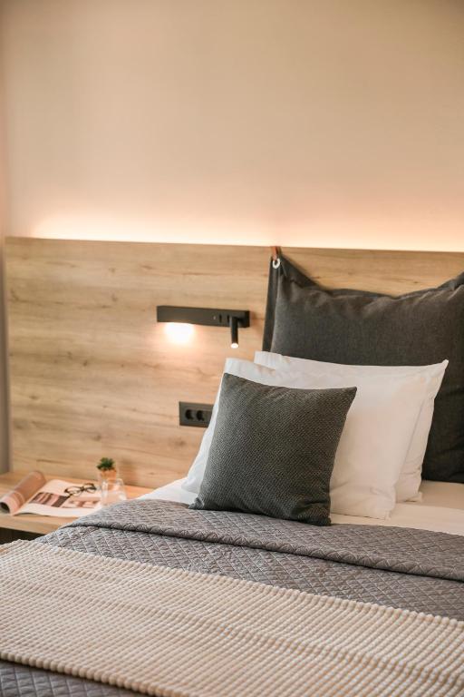 Postel nebo postele na pokoji v ubytování Skala Hotel