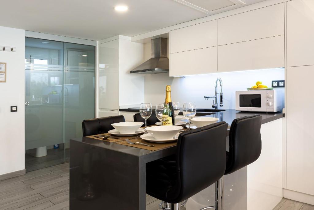 Kuchyňa alebo kuchynka v ubytovaní Modern & Elegant Loft
